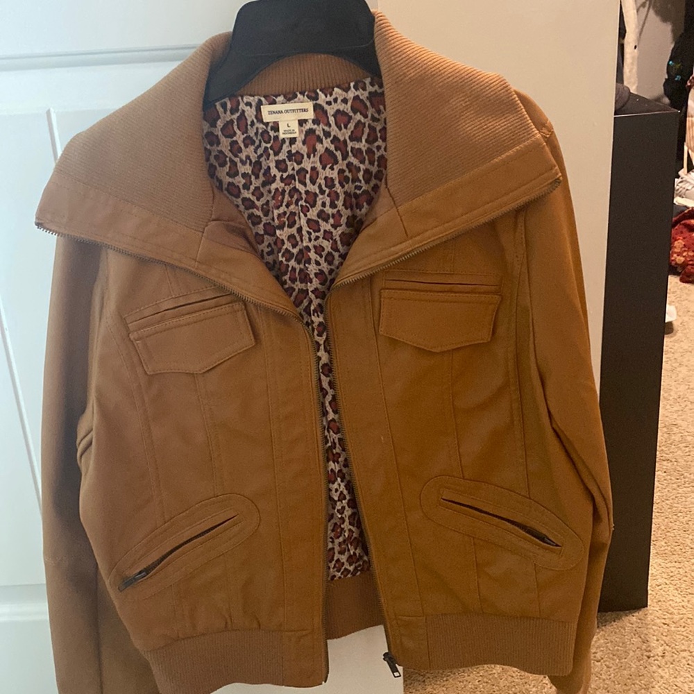 Jacket size L but fits like an M